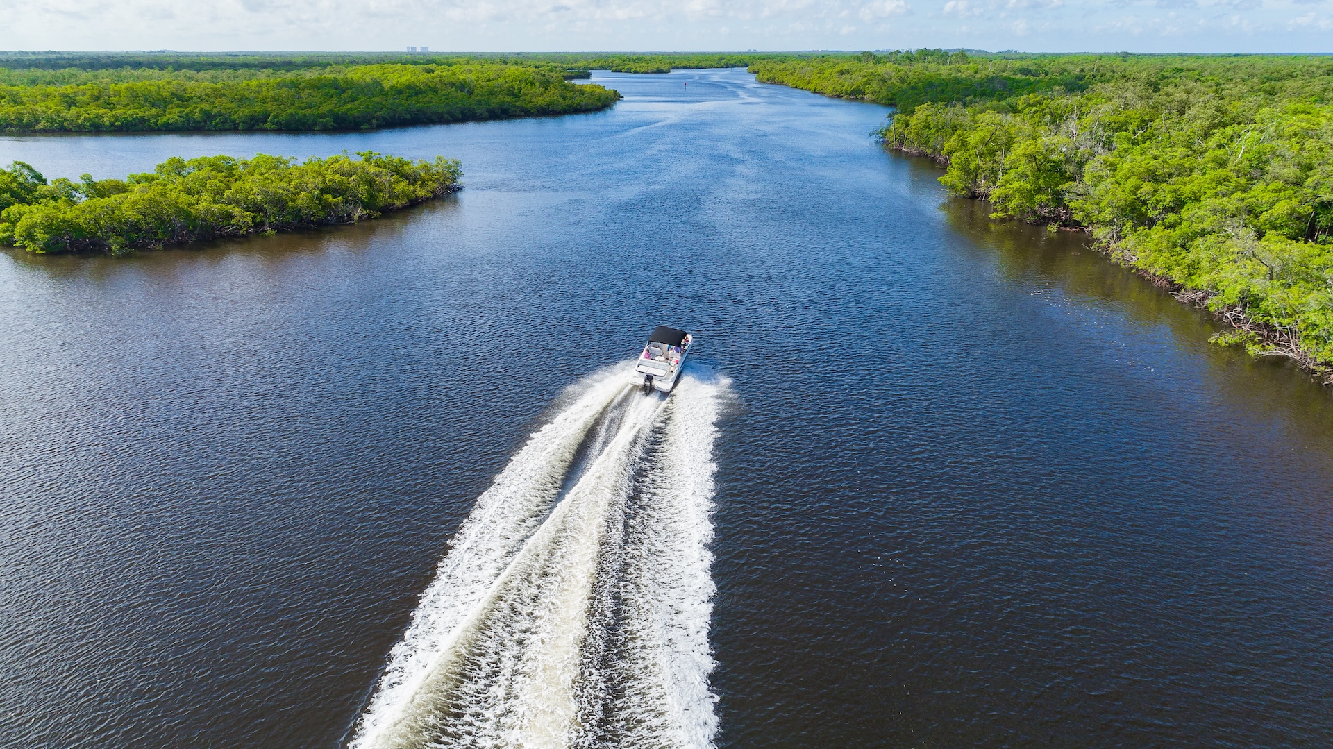 A boat on the water in the Everglades.