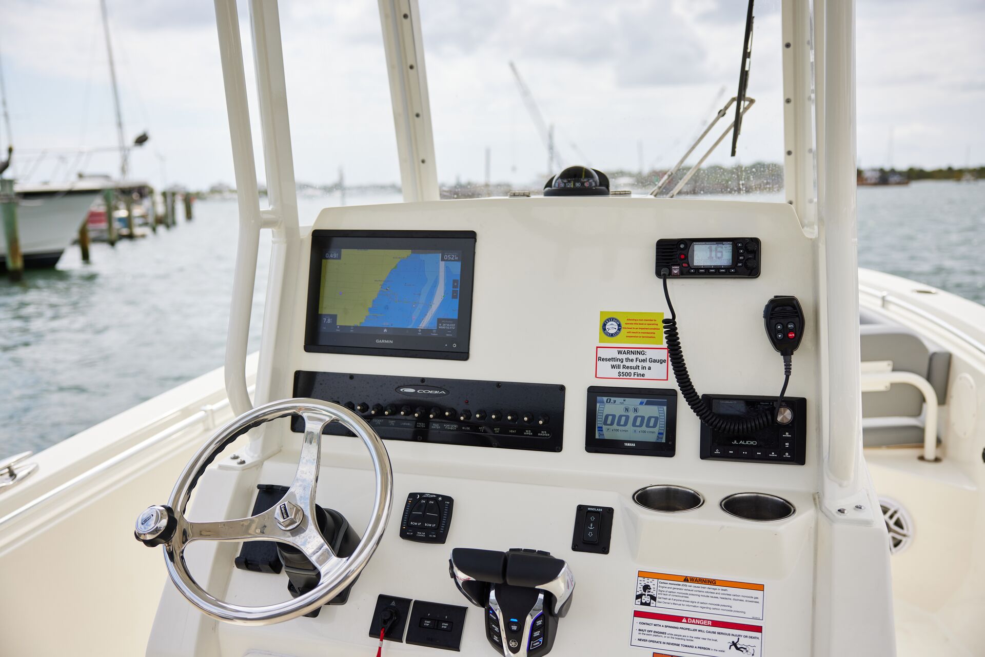 Helm of boat including the boat's radio, what is a marine radio concept.