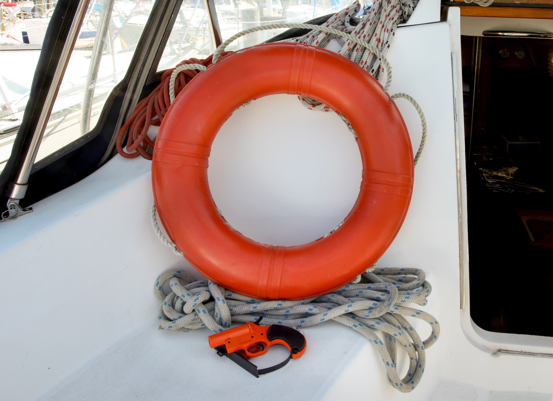 Flotation device and flare on a boat. 