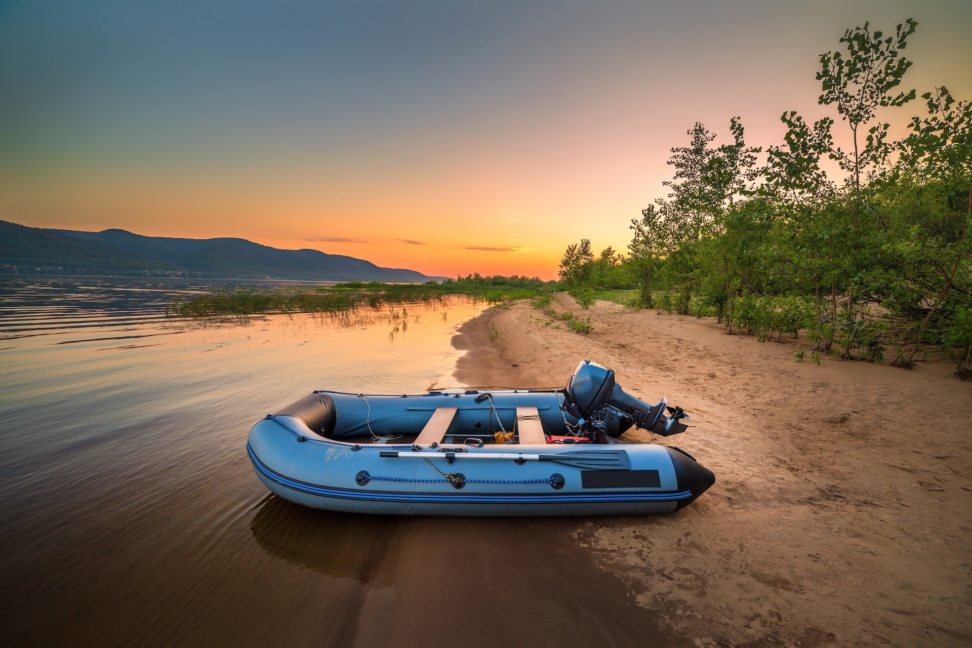 An inflatable boat on a beach. 