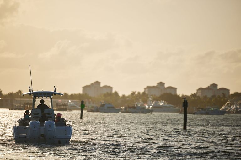 Boat on the water at dusk, how to file a float plan concept. 