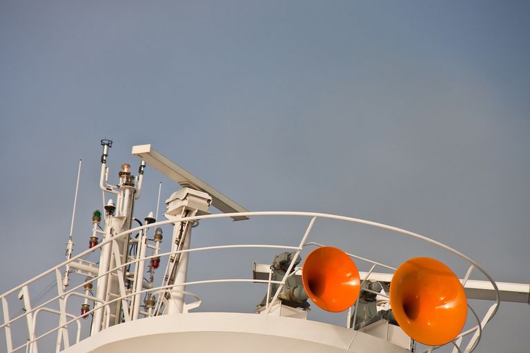 Orange sound horns on top of a boat, ship horn signals concept. 
