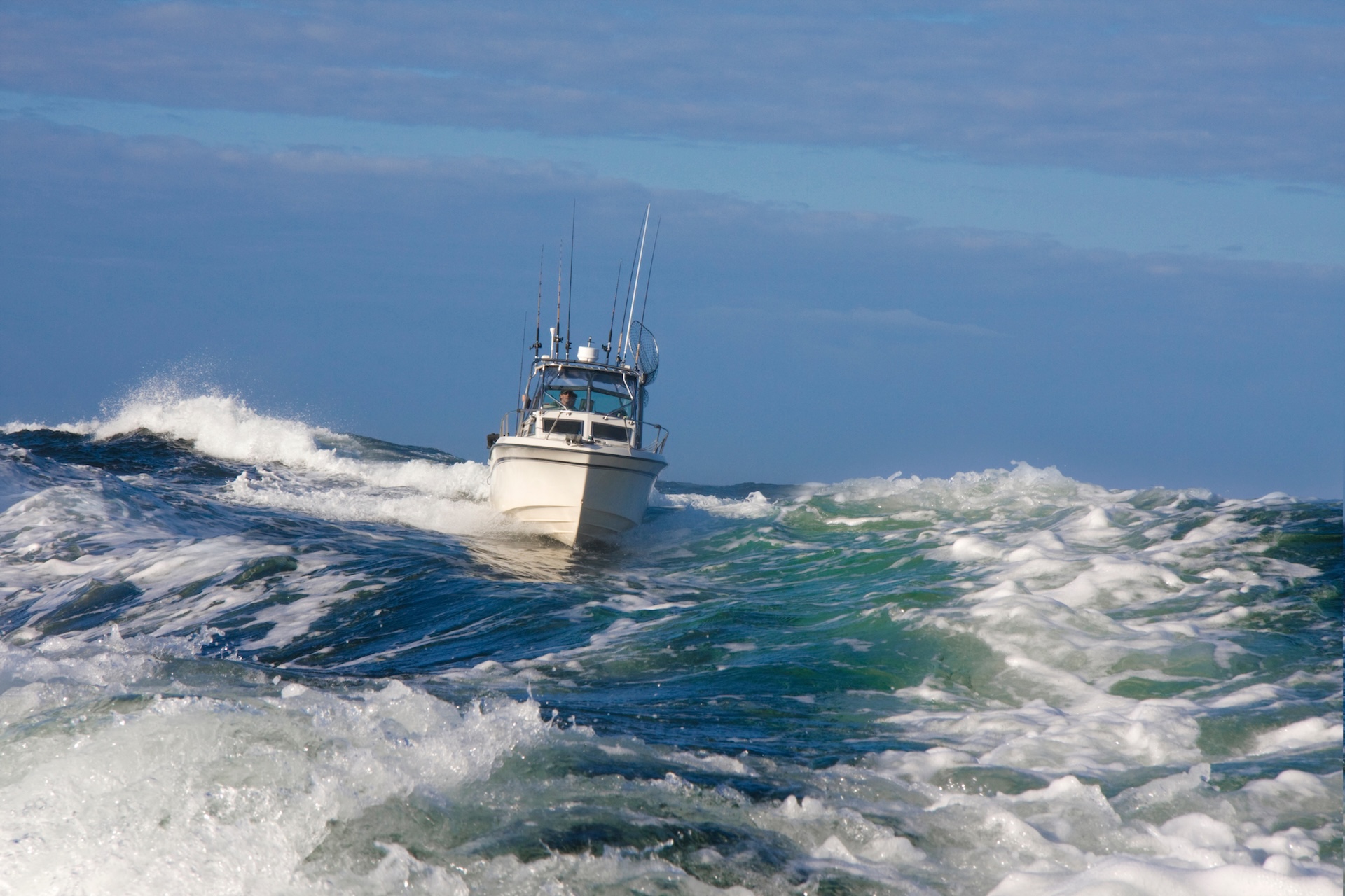 A boat in rough water, how to drive a boat in rough water concept.