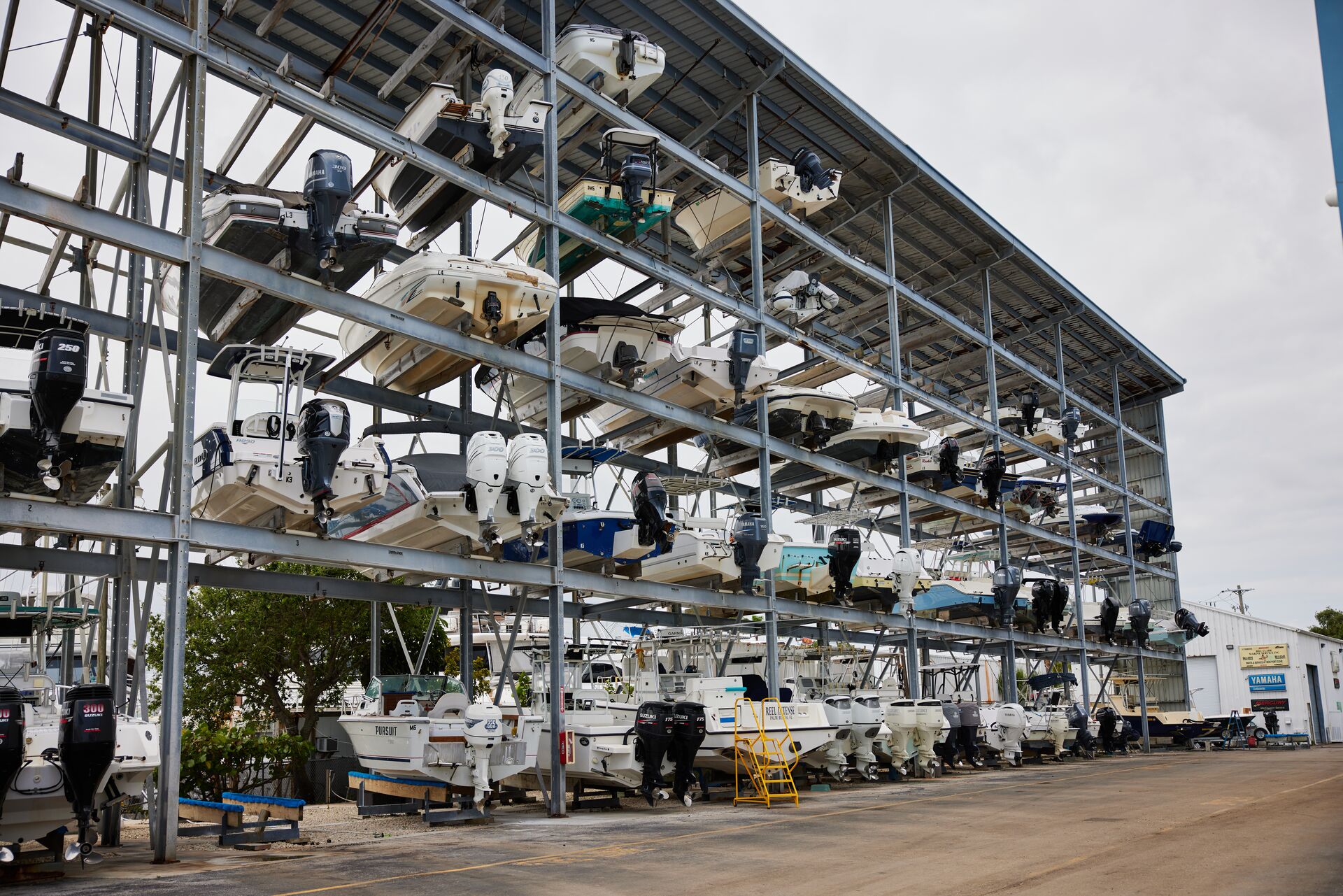 Boats out of water in storage, boat winterization process concept.