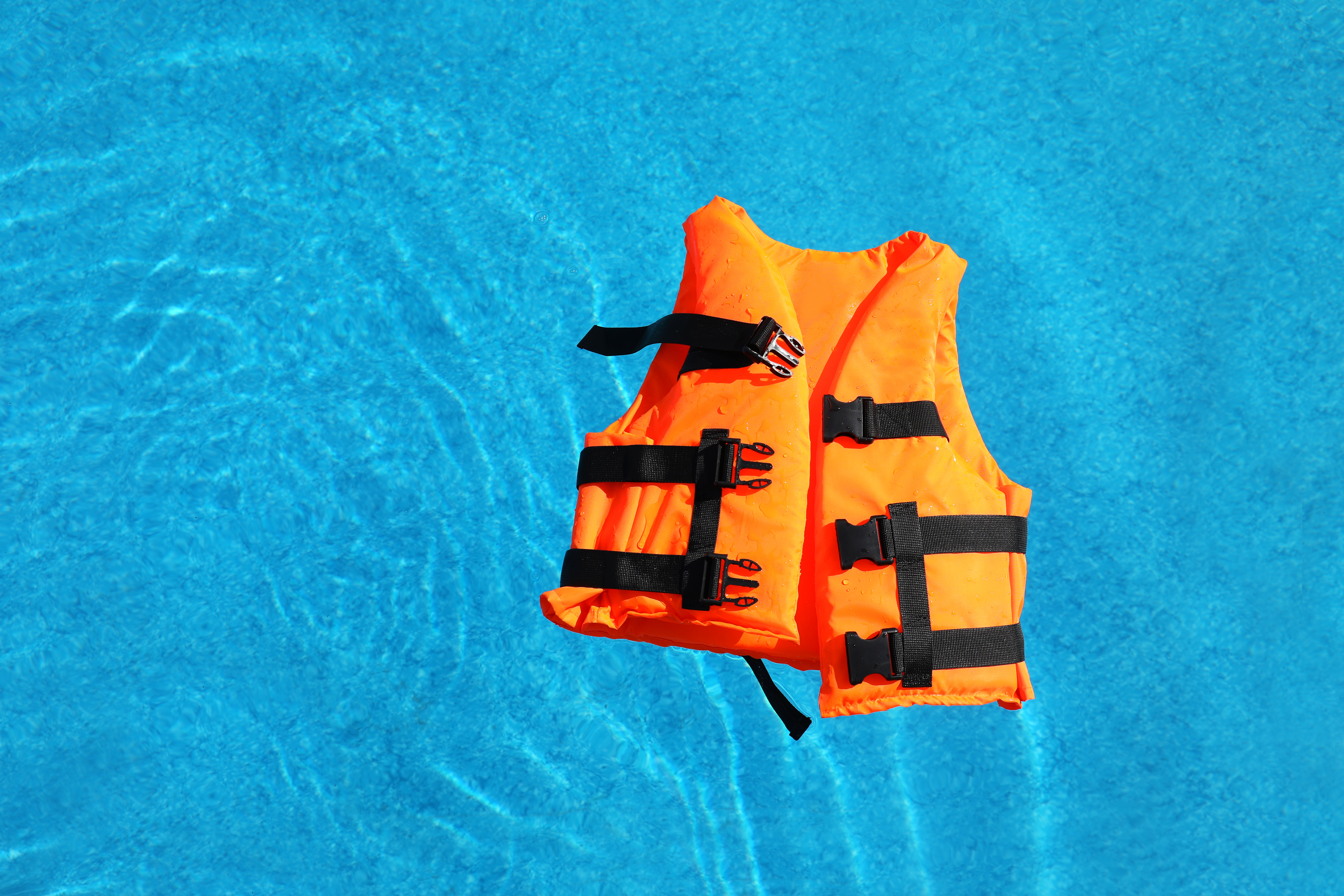 A lifejacket floating on the water. 